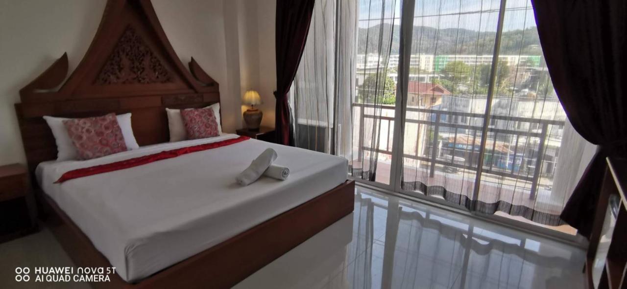 Sure Guesthouse Kamala Beach Buitenkant foto